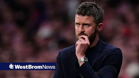 Michael Carrick looking worried on the touchline.