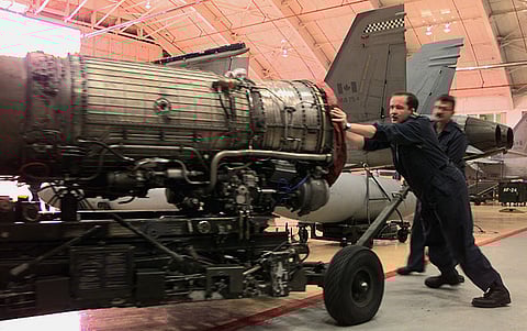 Aircraft technicians of 441 Fighter Squadron push a CF-18 Hornet engine on an engine cart through the CF-18 hangar at 4 Wing Cold Lake. Writer John Thomson asserts however, that the entire Canadian Armed Forces is 'dilapidated' and fast approaching irrelevance.