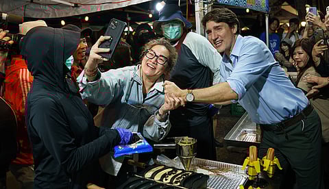Prime Minister Trudeau glad hands his way through the crowd at a festival in Markham, Ont. In 2015, his particular brand of retail politics that included bizarre behaviour, odd socks and selfies galore, won him election. If the recent byelection in Toronto St. Paul's is any indication, it's not going to work in 2025.