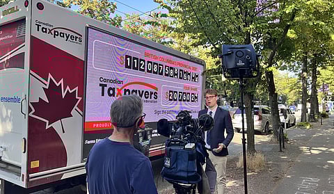 Led by Justin Trudeau, the Government of Canada has a debt problem. Sadly, so does BC, now in the last week before a provincial election. fter decades of balanced budgets, British Columbia's indebtedness has increased sharply over the last four years and now threatens its credit rating. Here, Carson Binda, B.C. director for the Canadian Taxpayers Federation, parks the CTF's Debt Clock truck outside Premier David Eby's Vancouver-Point Grey constituency office to drive home the point.