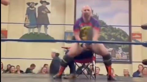 Regina Mayor getting lap dance from wrestler