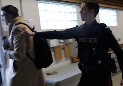Western Standard reporter James Snell being evicted by police from Mark Carney's leadership campaign launch in Edmonton.