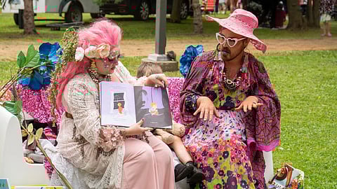 Drag queens read a story during the Teddy Bear Picnic in Thunder Bay, Ont., in July 2023.