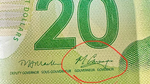 Mark Carney’s signature features a distinct ‘felon’s claw’