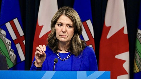 Alberta Premier Danielle Smith speaks with reporters on Tuesday