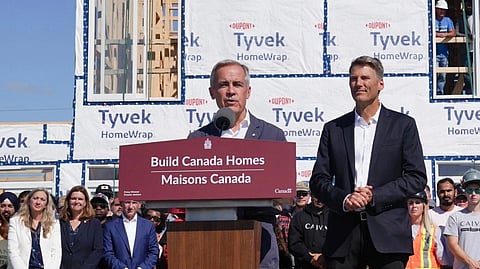 Prime Minister Mark Carney and Housing Minister Gregor Robinson