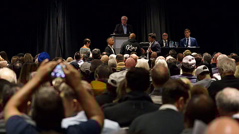 A concerned resident confronts Richmond Mayor Malcolm Brodie