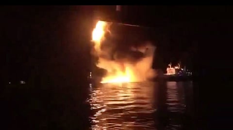 US-owned crude oil tanker the SAFESEA VISHNU burns after being struck by an Iranian drone