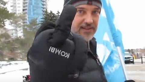 Gil McGowan gives the middle finger to the Western Standard.