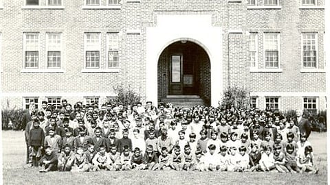 Indigenous children, assembled for a group picture at a residential school. In his new book 'Grave Error,' Professor Tom Flanagan challenges the prevailing narrative that some were murdered by priests and nuns and that so-far-uninvestigated sites alleged to be graves contain the victims.