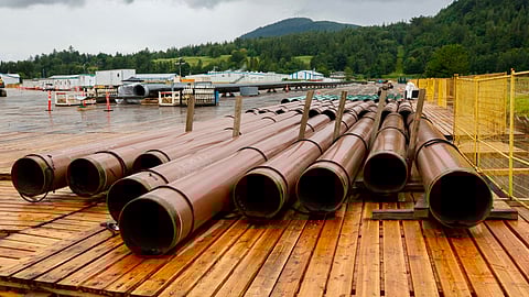 Steel pipe for the Trans Mountain expansion project sits in a storage lot outside of Abbotsford, B.C., on June 6, 2021.