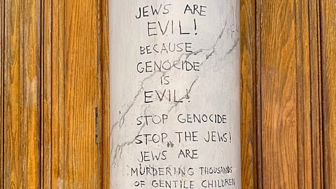 Antisemitic graffiti scrawled between the front doors of the Congregation Emanu-el in Victoria, western Canada's oldest synagogue. 2025.