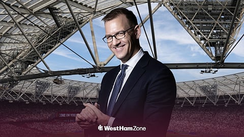 Daniel Krestinksy smiling with the London Stadium behind him.