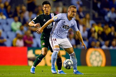 VIGO, SPAIN - SEPTEMBER 26: Stanislav Lobotka of Celta de Vigo competes for the ball against Wu Lei of Espanyol during the Liga match between RC Celta de Vigo and RCD Espanyol at Abanca-Balaídos on September 26, 2019 in Vigo, Spain. (Photo by Octavio Passos/Getty Images)