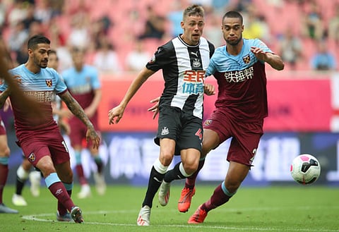 Ravel Morrison reacts as Winston Reid bids farewell to West Ham