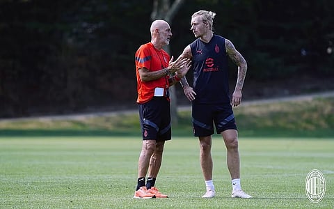 سيمون كاير - ستيفانو بيولي