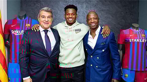 أنسو فاتي ووالده - خوان لابورتا