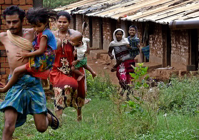 Residents running away to escape from elephant attack near mangarai in anaikatti forest on friday.Express/a.Raja chidambaram.