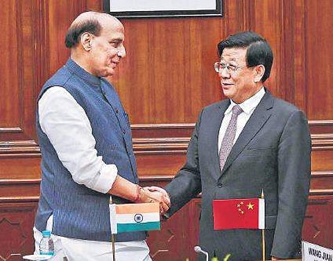 Home Minister Rajnath Singh with Chinese State Councillor and Minister for Public Security, Zhao Kezhi, in New Delhi, Monday| PTI