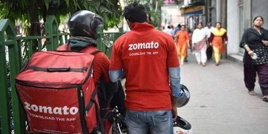 Zomato management team during COVID-19 handling restaurant closures and implementing safety protocols for delivery