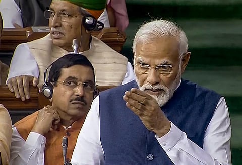 Prime Minister Narendra Modi replies on the Motion of No-Confidence in the Lok Sabha in the Monsoon session of Parliament (Photo | PTI)