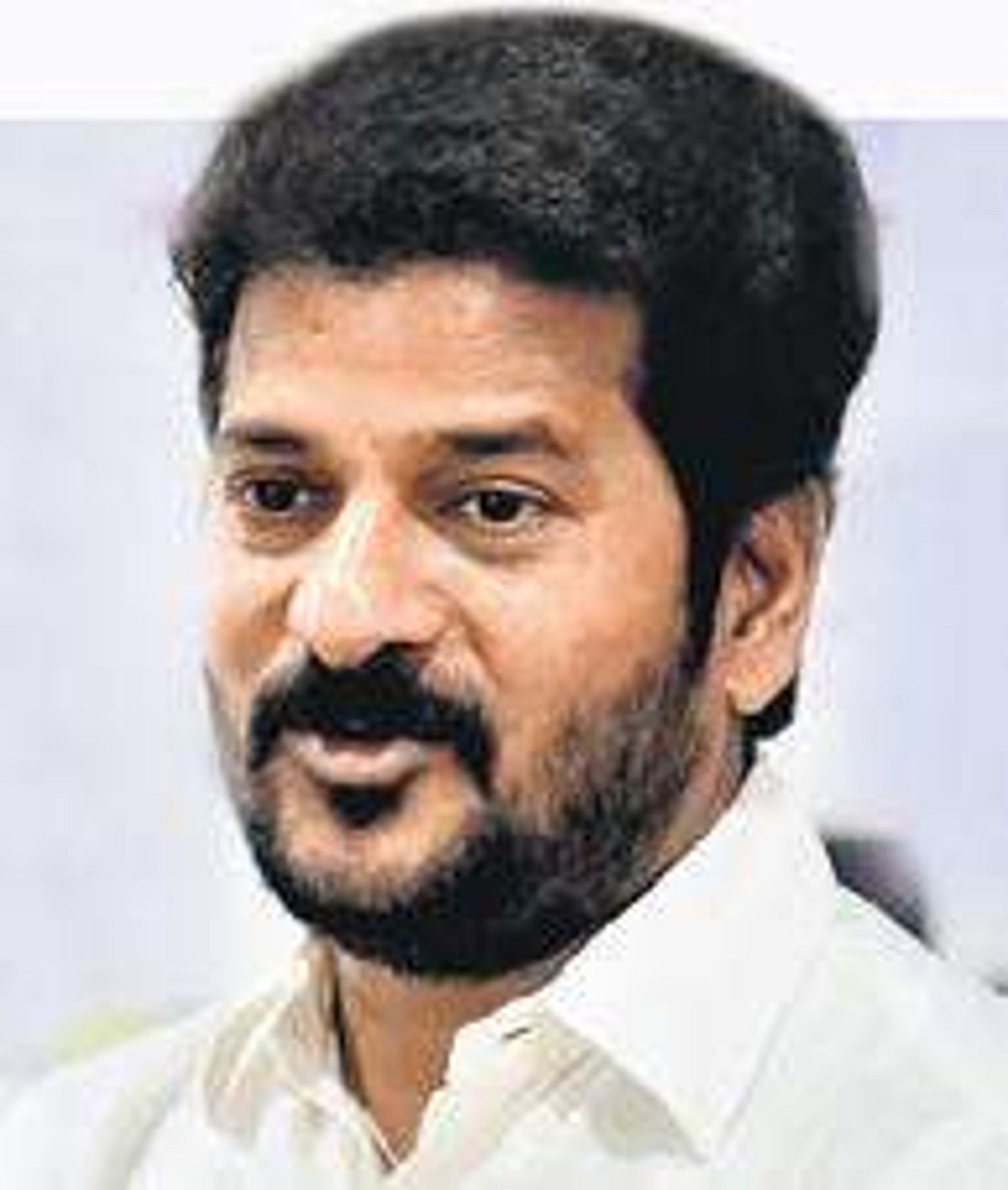 Revanth Reddy plays to the crowd at Cherlapally