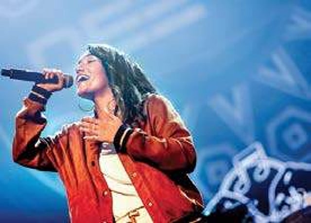 Dee MC raps her way into hearts