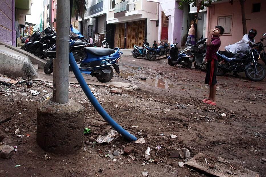 Woman en route to work electrocuted after stepping on cable hidden by ...