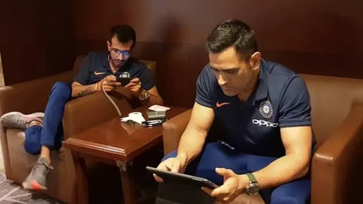 MS Dhoni gaming on his tablet