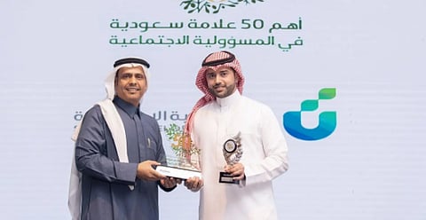 أثناء تسلم الجائزة
