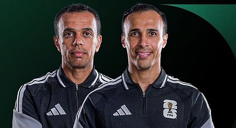  الحكمان السعوديان خالد الطريس ومحمد العبكري 