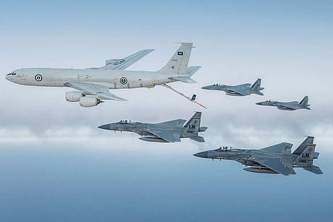 Saudi Arabia’s Royal air force F-15C Eagles fly in formation with U.S. Air Force