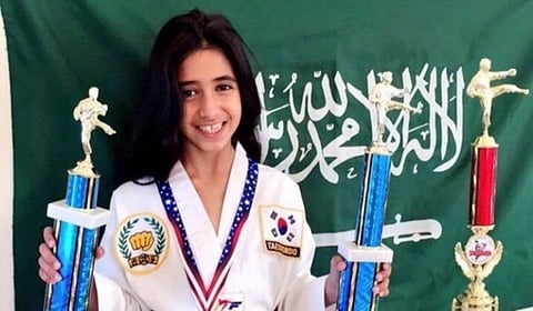 Kind carries her medals