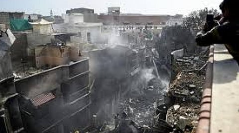 All but two of the 99 people on board the PIA plane were killed when it crashed into a Karachi residential neighborhood | AFP
