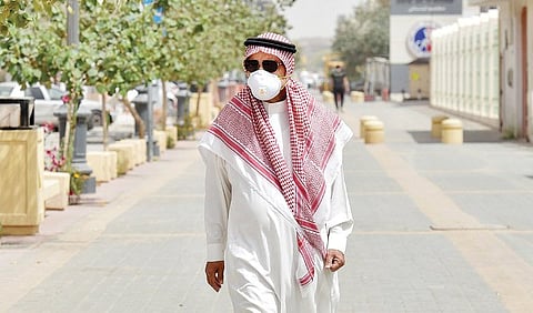 According to the WHO, people can catch COVID-19 from others who have the virus. The disease can spread from person to person through small droplets from the nose or mouth. (File/AFP)
