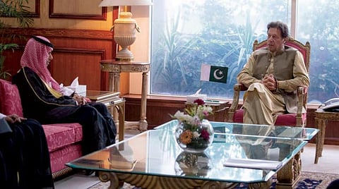 Pakistani Prime Minister Imran Khan meets with Saudi Foreign Minister Prince Faisal Bin Farhan (SPA)
