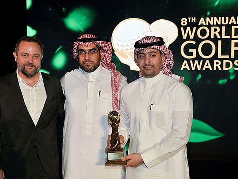 Ed Edwards, Fawaz Al Ayban, Meshari Al Bahli of Golf Saudi collect their World Golf Award
