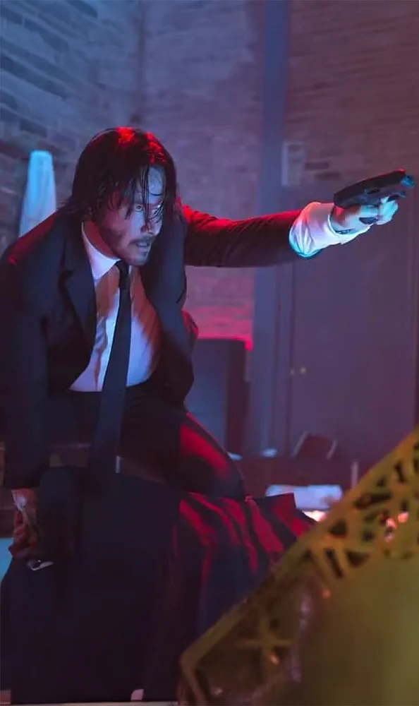 The Club Shootout (John Wick) : Wick rampages through a neon club, dispatching enemies with precision perfection and unrelenting fury.