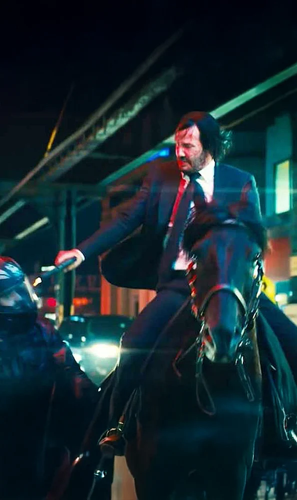 Horseback Chase (John Wick: Chapter 3 – Parabellum) : John jets through the NYC streets on horseback, evading bullets and discomfiting assassins with flair.