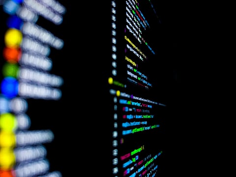 Close up of a screen displaying multiple servers and code