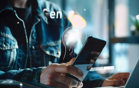 A worker using a smartphone to launch an AI image generator and create appealing pictures