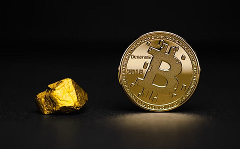 Why Is Bitcoin Compared to Gold in Price Stability Debates?