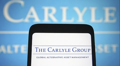 Carlyle Group (NASDAQ:CG) Stock Upgraded to Hold as Shares Trade Near 52-Week Low
