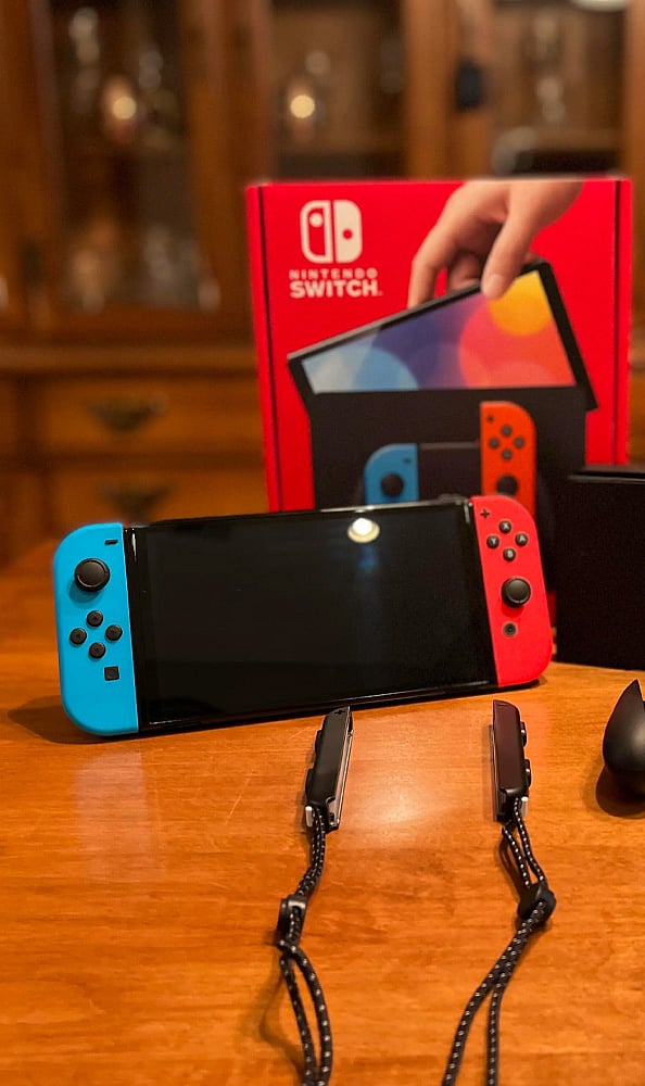 Nintendo Switch OLED: The Nintendo Switch OLED costs around Rs. 34,990 and offers a bright screen, making handheld and TV gaming appealing. 