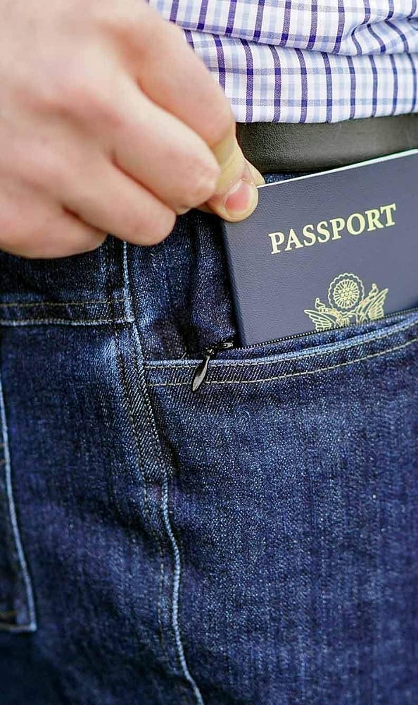 Use a Secure Jacket Pocket: If permitted by screening procedures, keep your phone inside a jacket pocket before placing the jacket in the tray for scanning.