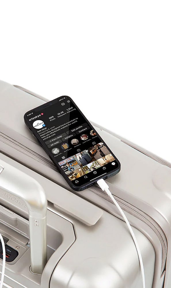 Phone in carry-on: Place your phone inside your carry-on bag before it reaches the X-ray belt. TSA says small items are safer in a bag than loose on the belt.