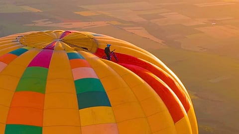 World record by combining cycling and parachuting