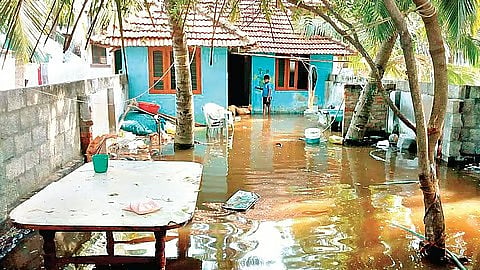 Houses sinking due to raised road heights