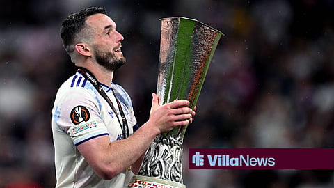John McGin lifting the Europa League as Aston Villa captain.