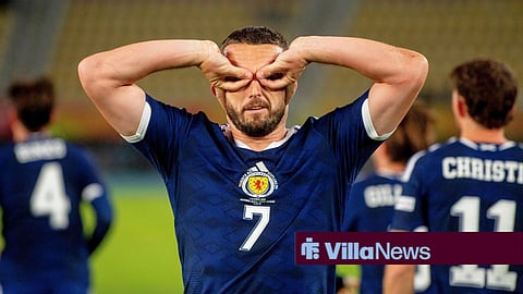 Aston Villa midfielder John McGinn celebrating after scoring for Scotland